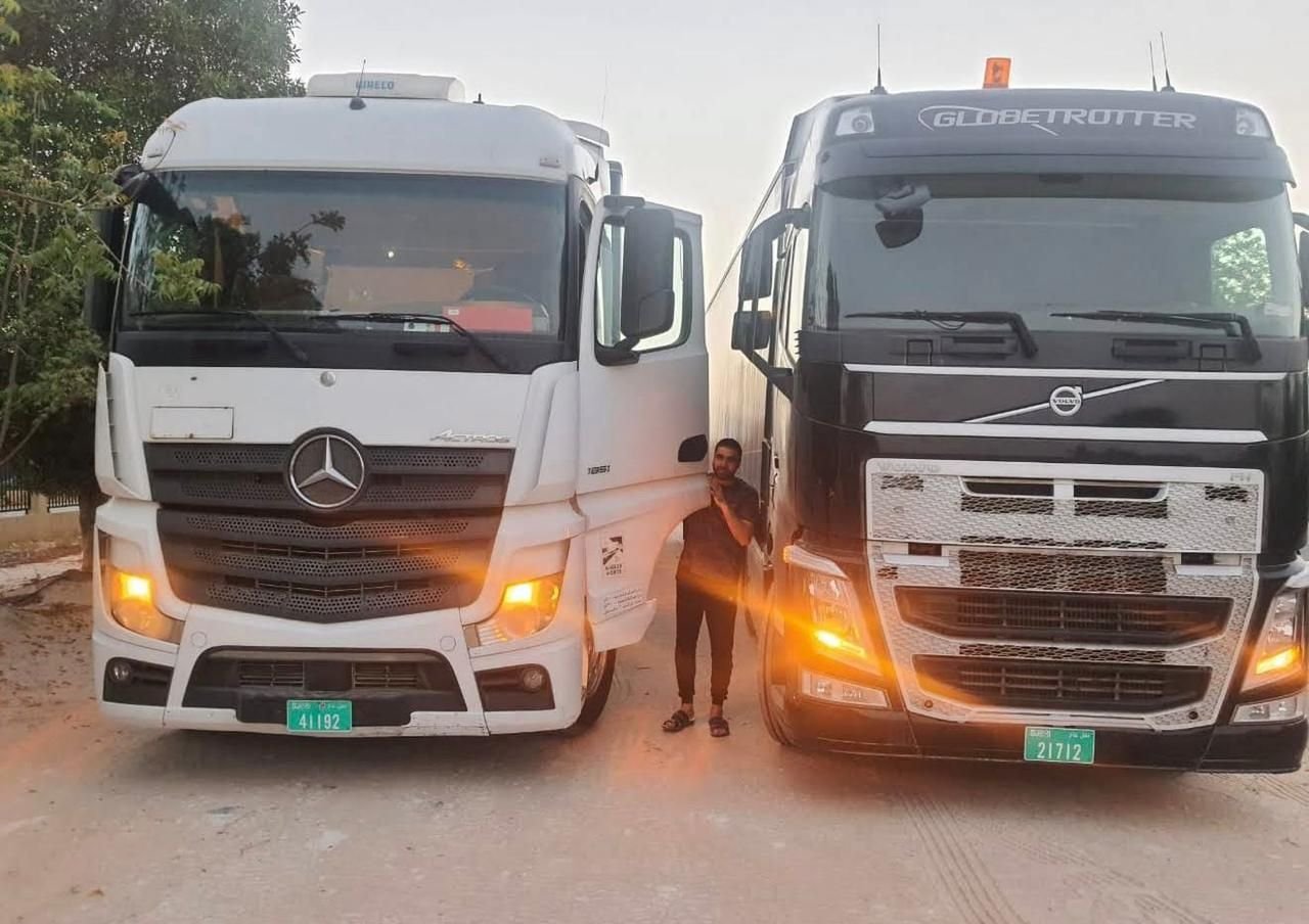 Wadi Kalam driver with heavy trucks fleet